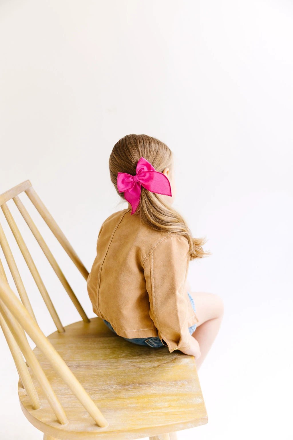 White Solid Medium Bow by Evie Pearl Handmade