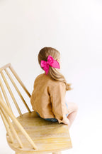 White Solid Medium Bow by Evie Pearl Handmade