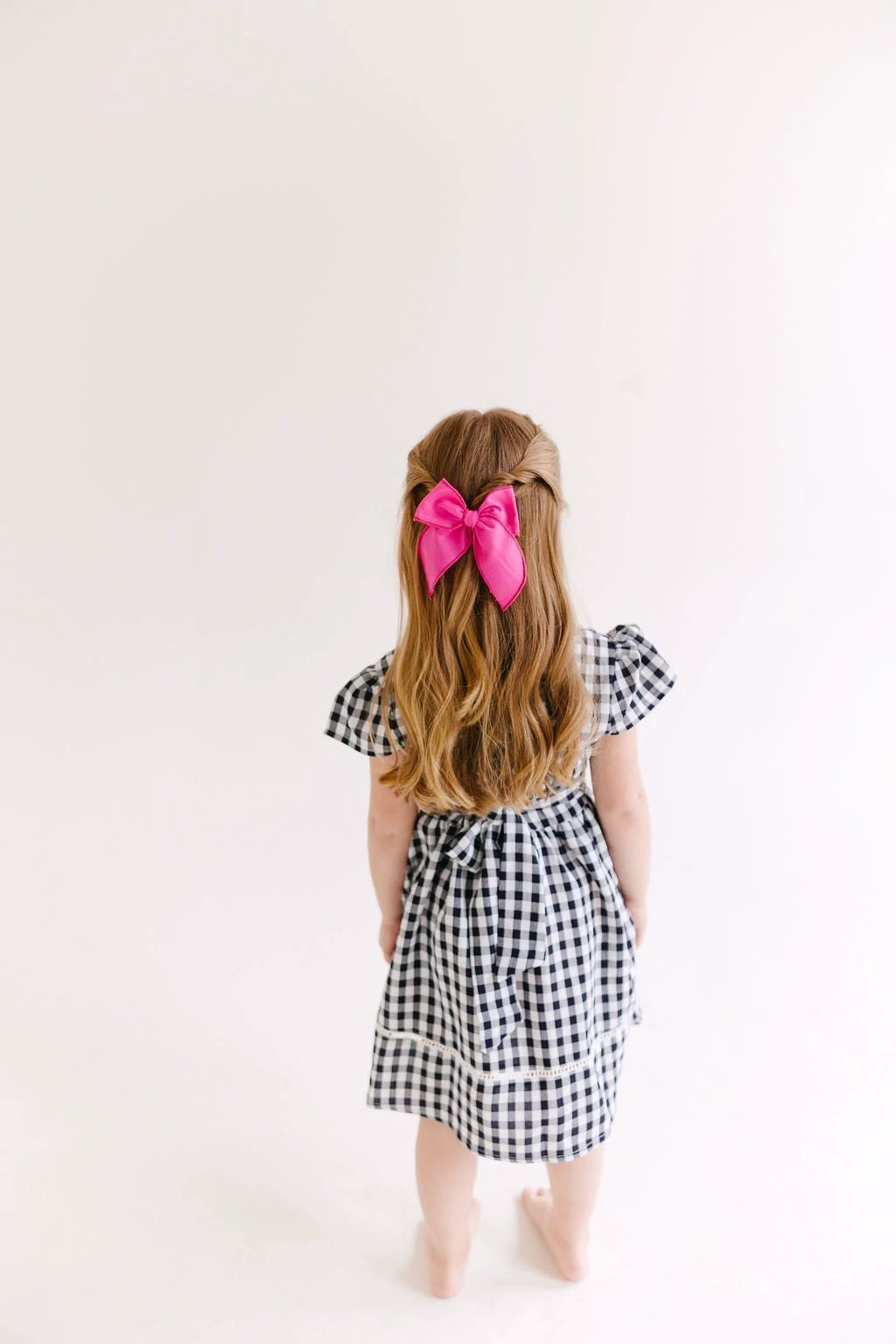 White Solid Medium Bow by Evie Pearl Handmade
