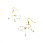 With a Bow earrings by Alegria Accessories Inc
