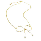 With a Bow necklace by Alegria Accessories Inc