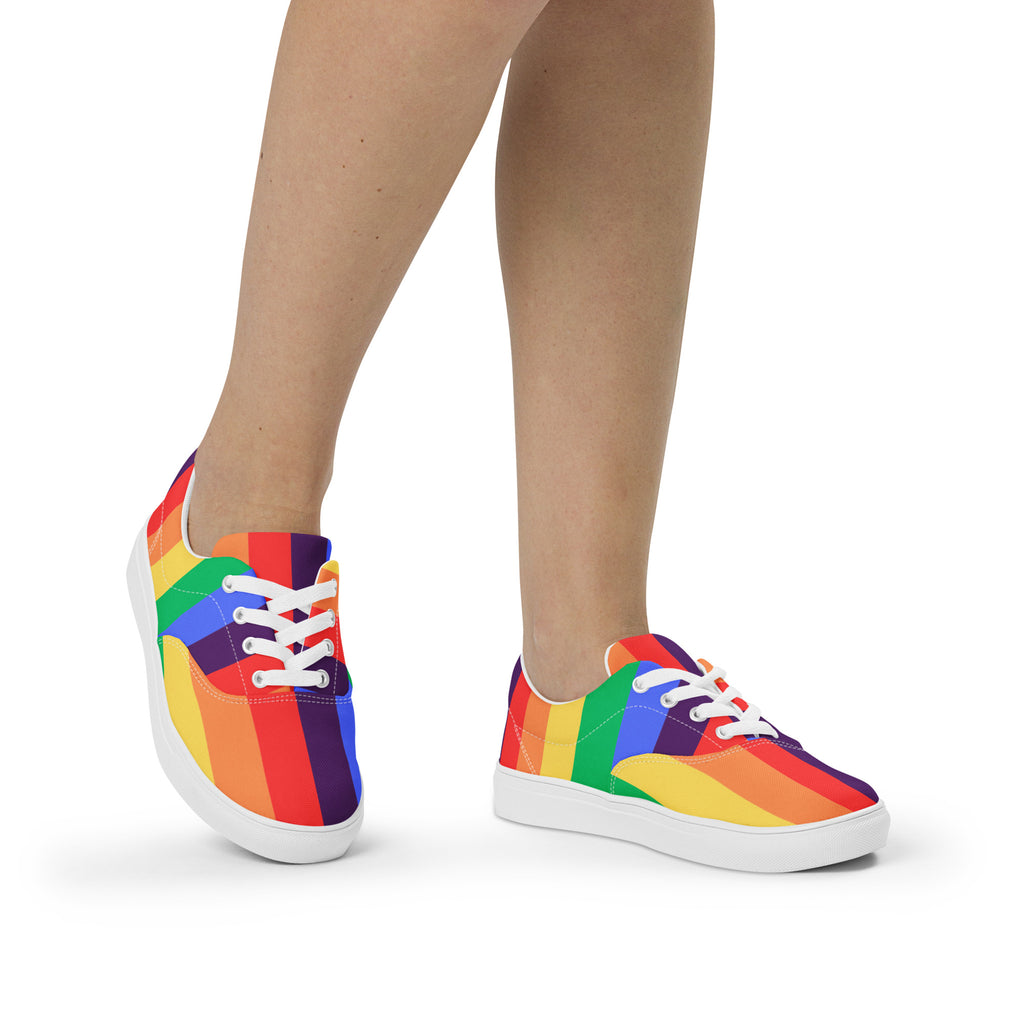 Product mockup of a pair of women's rainbow striped shoes with white soles and white laces