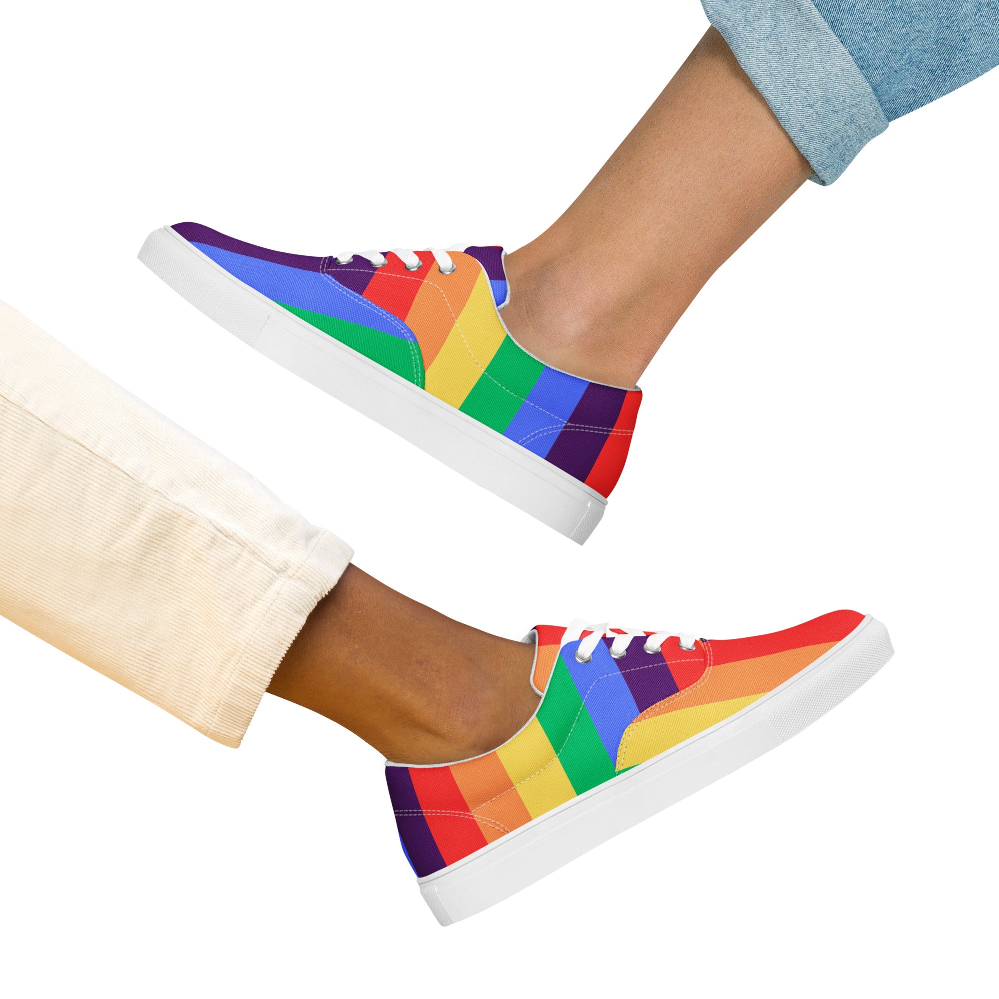 Product mockup of a pair of women's rainbow striped shoes with white soles and white laces