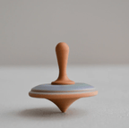 Wooden Spinning Top Toy painted by PoppyBabyCo