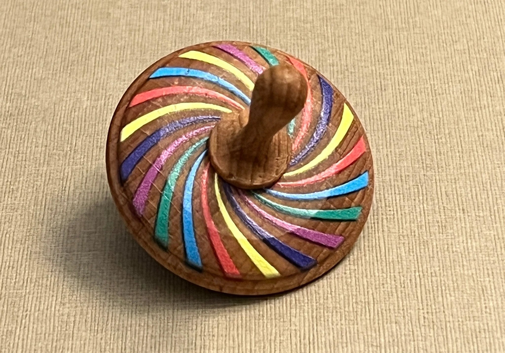 Wooden Spinning Top Toy painted by PoppyBabyCo