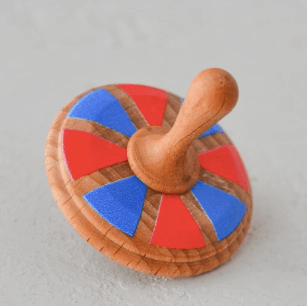 Wooden Spinning Top Toy painted by PoppyBabyCo