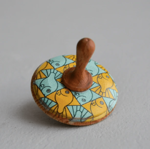 Wooden Spinning Top Toy painted by PoppyBabyCo