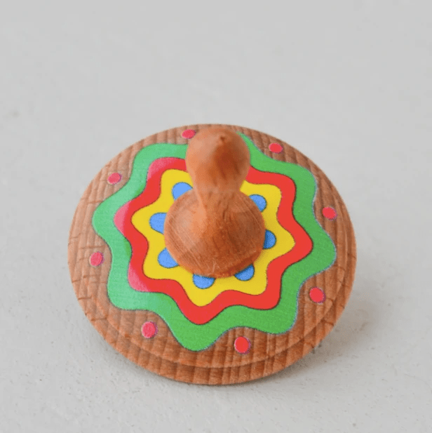 Wooden Spinning Top Toy painted by PoppyBabyCo
