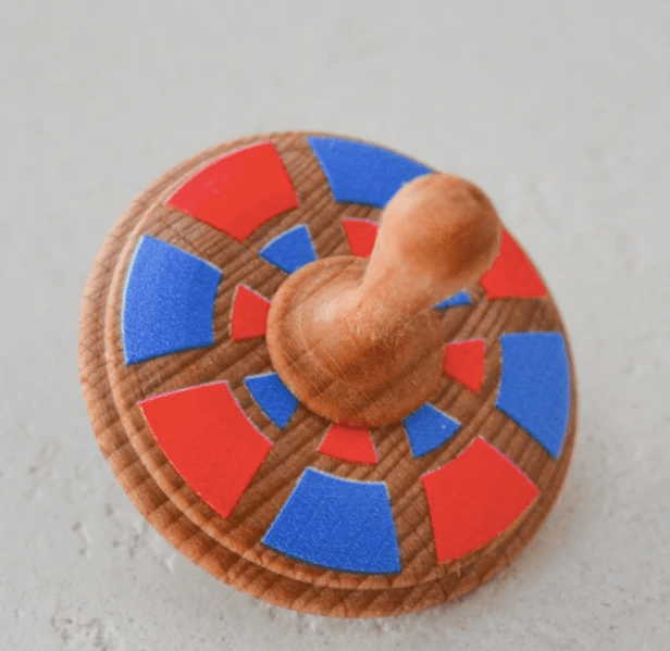 Wooden Spinning Top Toy painted by PoppyBabyCo