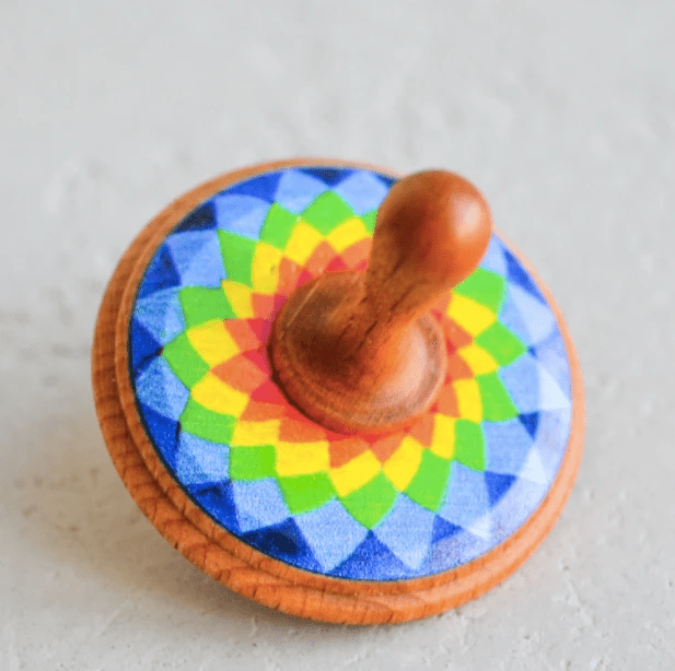 Wooden Spinning Top Toy painted by PoppyBabyCo