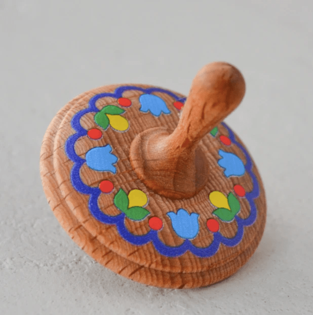 Wooden Spinning Top Toy painted by PoppyBabyCo