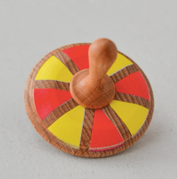 Wooden Spinning Top Toy painted by PoppyBabyCo