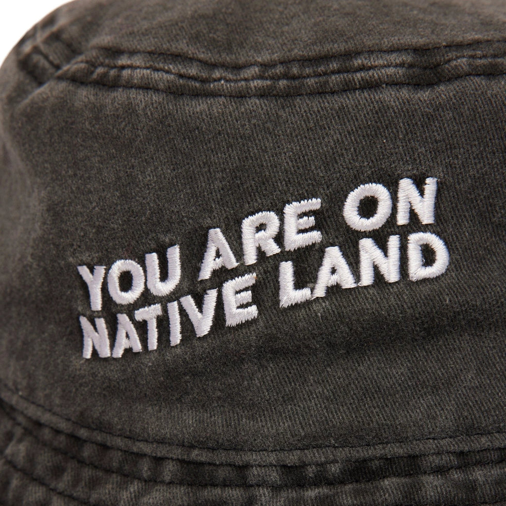 'YOU ARE ON NATIVE LAND' BUCKET HAT by Urban Native Era