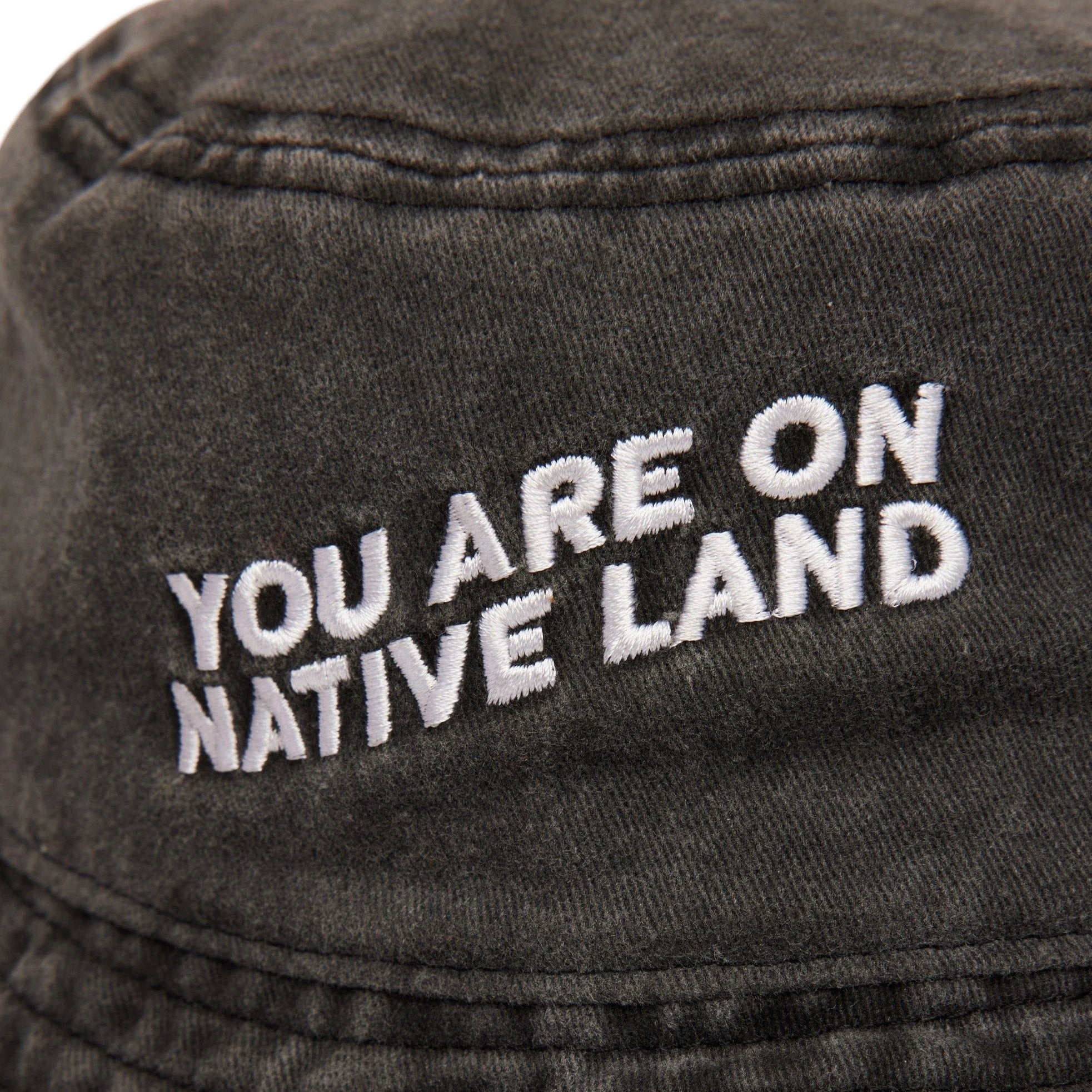 'YOU ARE ON NATIVE LAND' BUCKET HAT by Urban Native Era