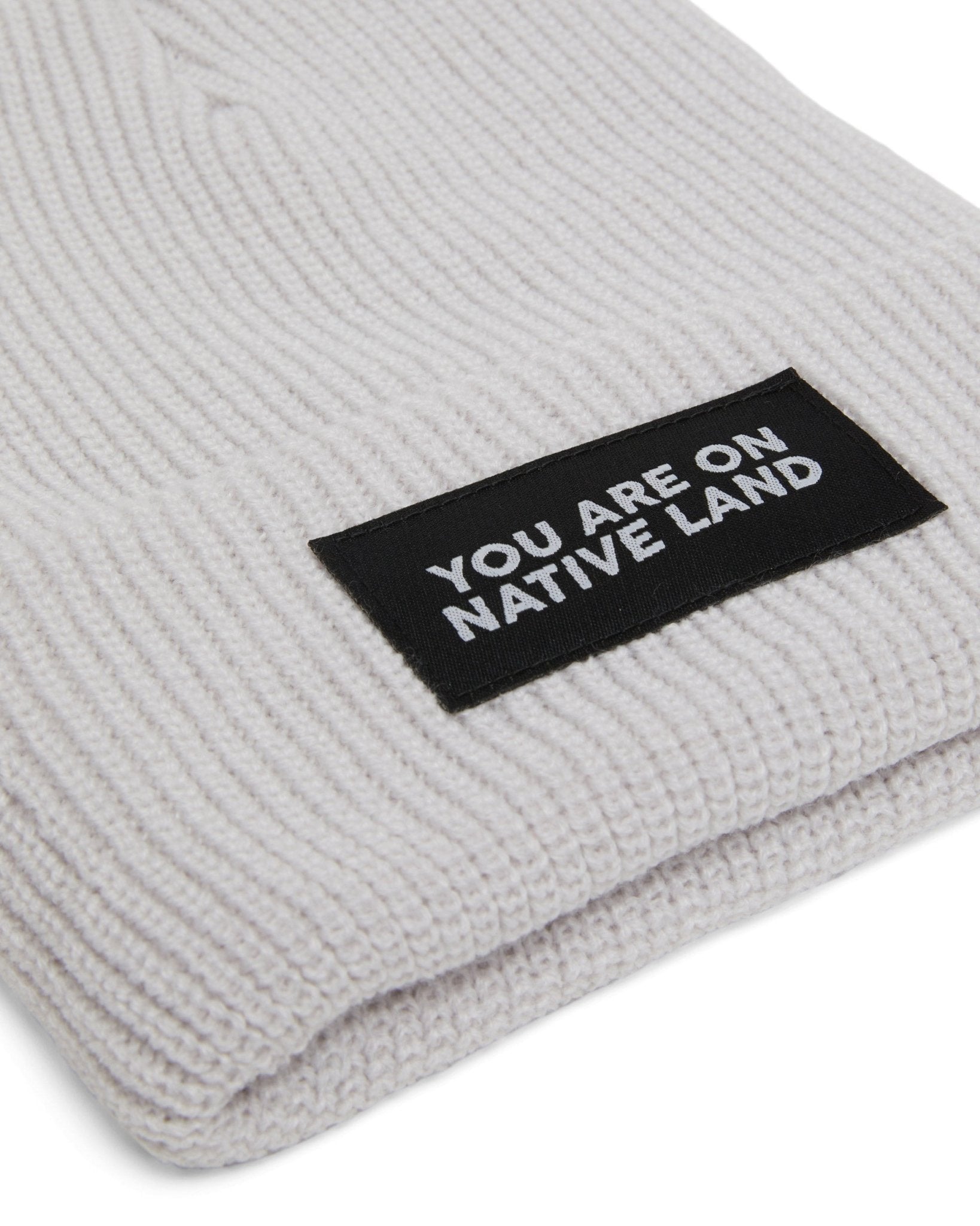 'YOU ARE ON NATIVE LAND' RIBBED BEANIE by Urban Native Era