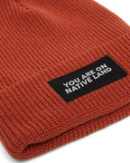 'YOU ARE ON NATIVE LAND' RIBBED BEANIE by Urban Native Era