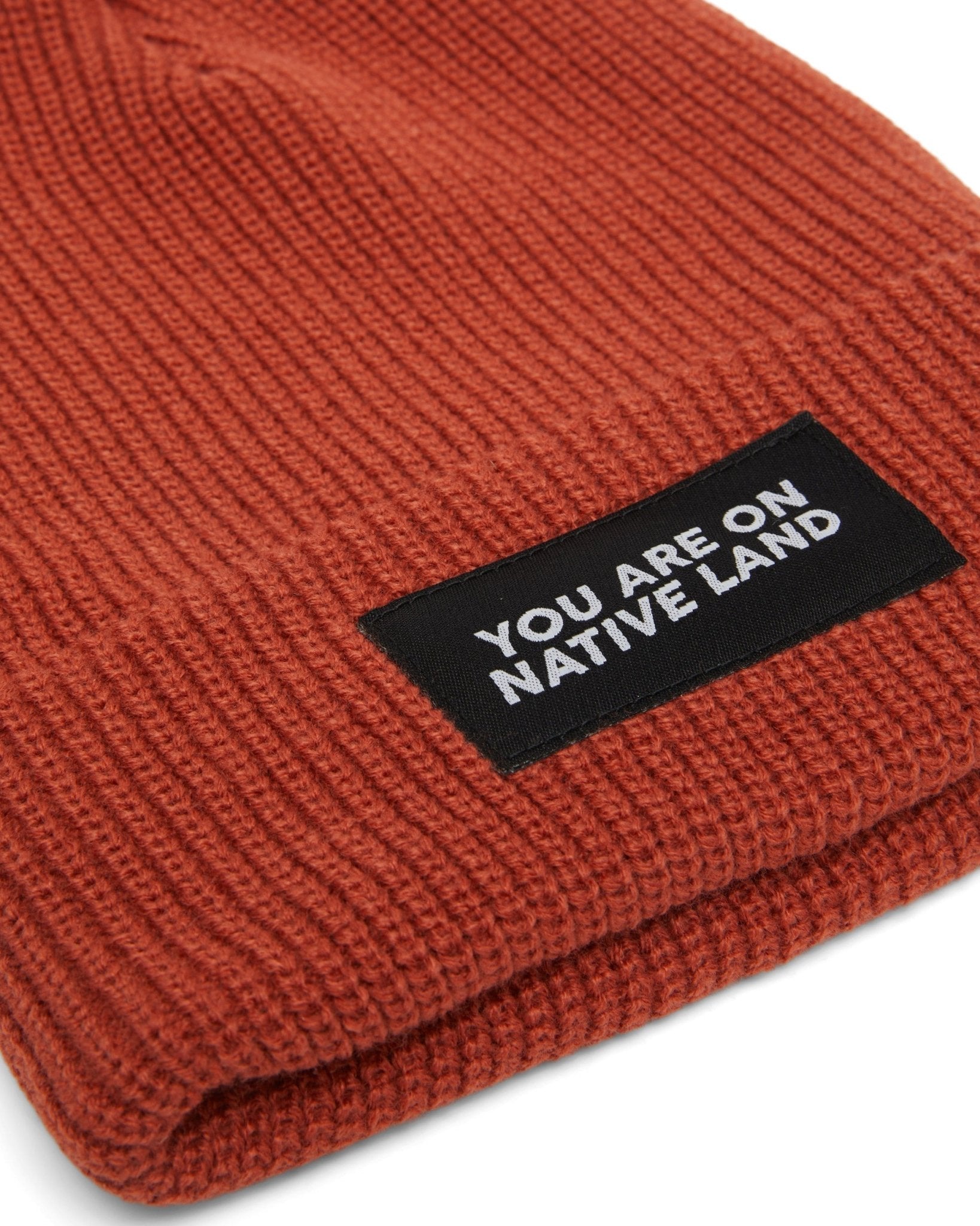'YOU ARE ON NATIVE LAND' RIBBED BEANIE by Urban Native Era