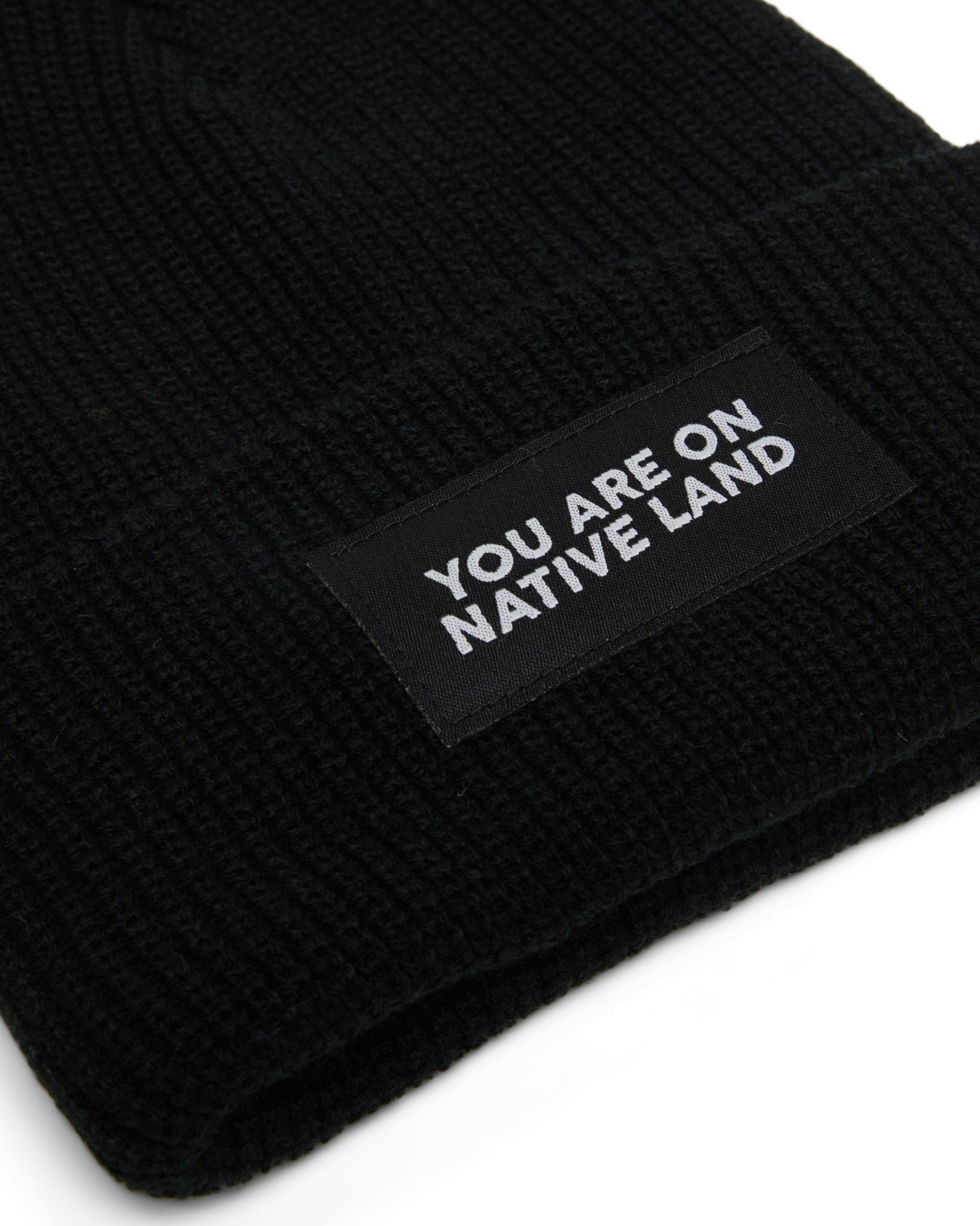 'YOU ARE ON NATIVE LAND' RIBBED BEANIE by Urban Native Era