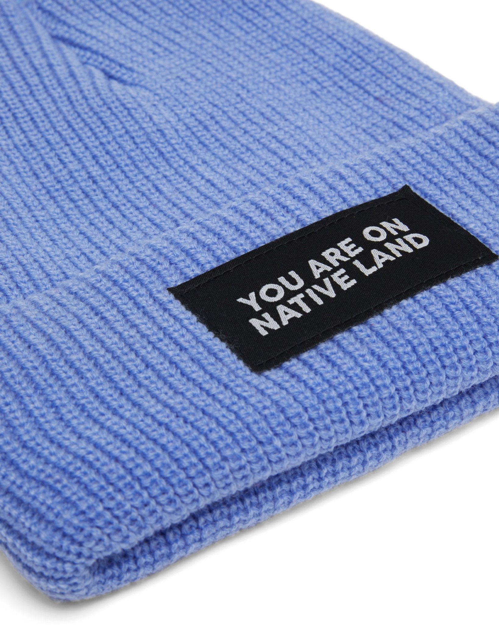 'YOU ARE ON NATIVE LAND' RIBBED BEANIE by Urban Native Era