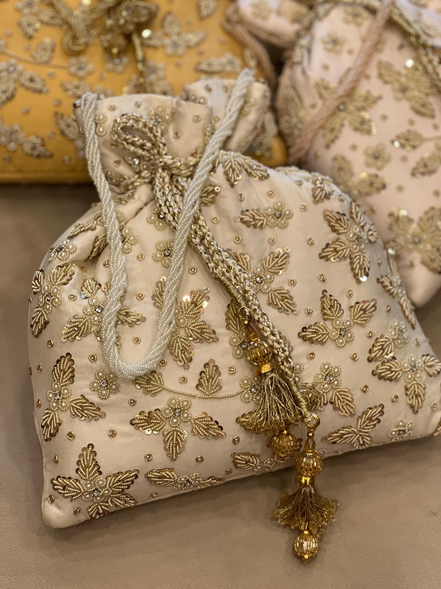 Zardosi Work Silk Potli Bag with Hand Embroidery & Designer Closing Thread La Vie Bien Zardosi Work Silk Potli Bag with Hand Embroidery & Designer Closing Thread