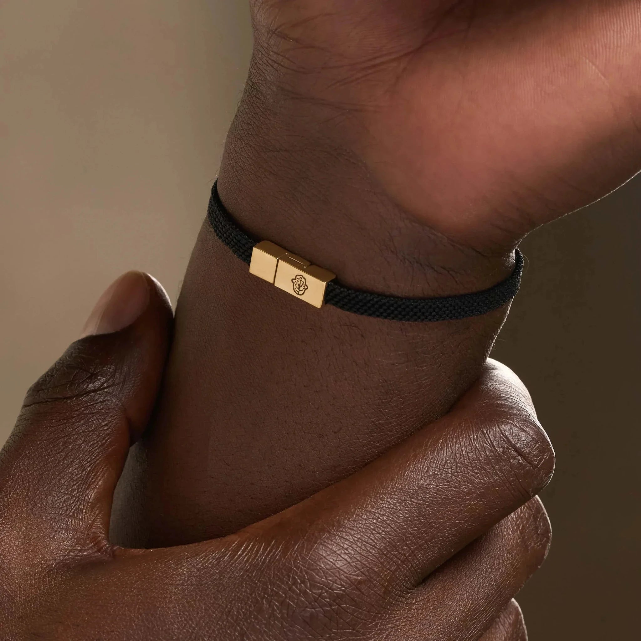 Zen Living Karma Circle Men’s Black String Bracelet